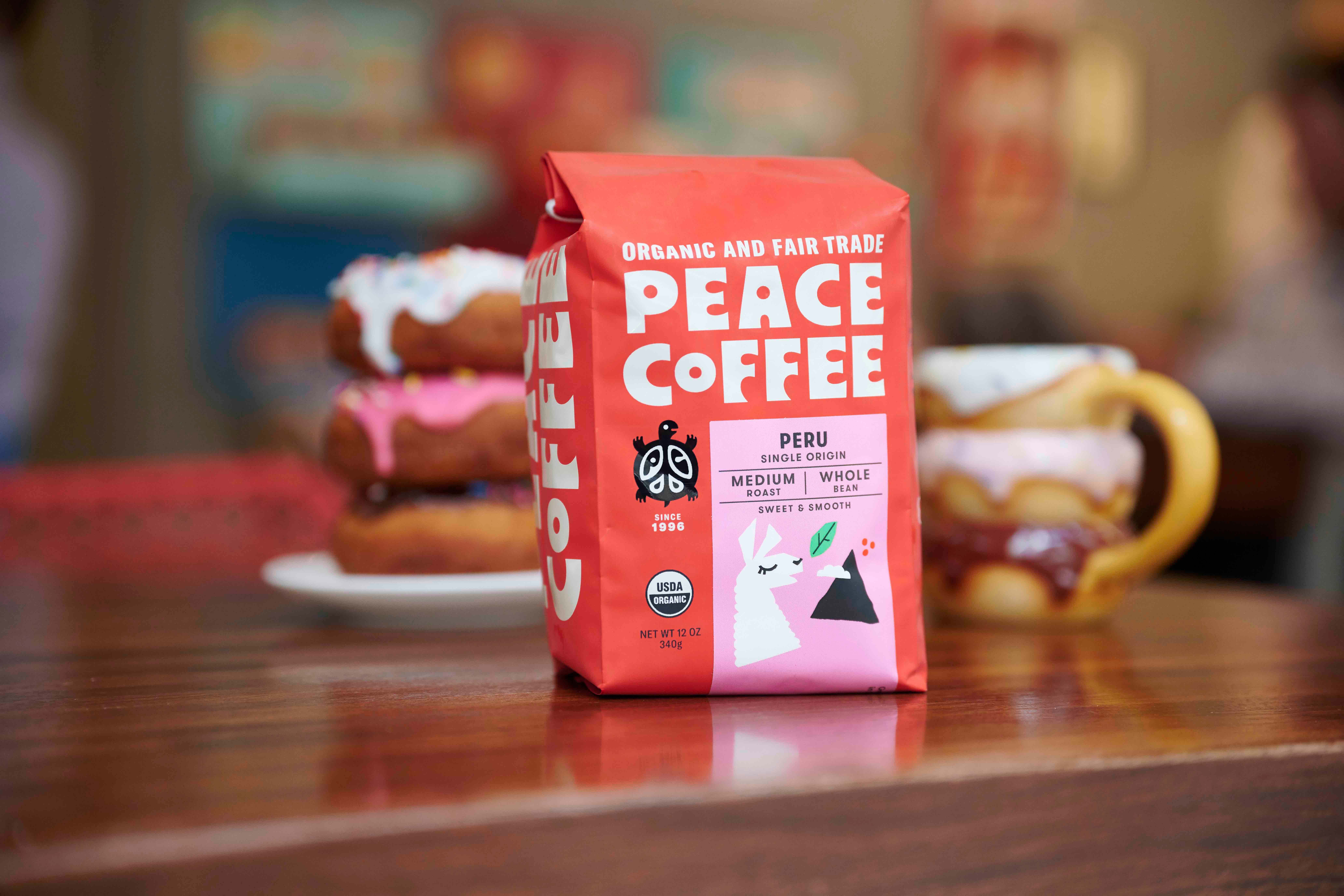 bag-of-organic-peruvian-coffee organic peruvian coffee with donuts and a mug