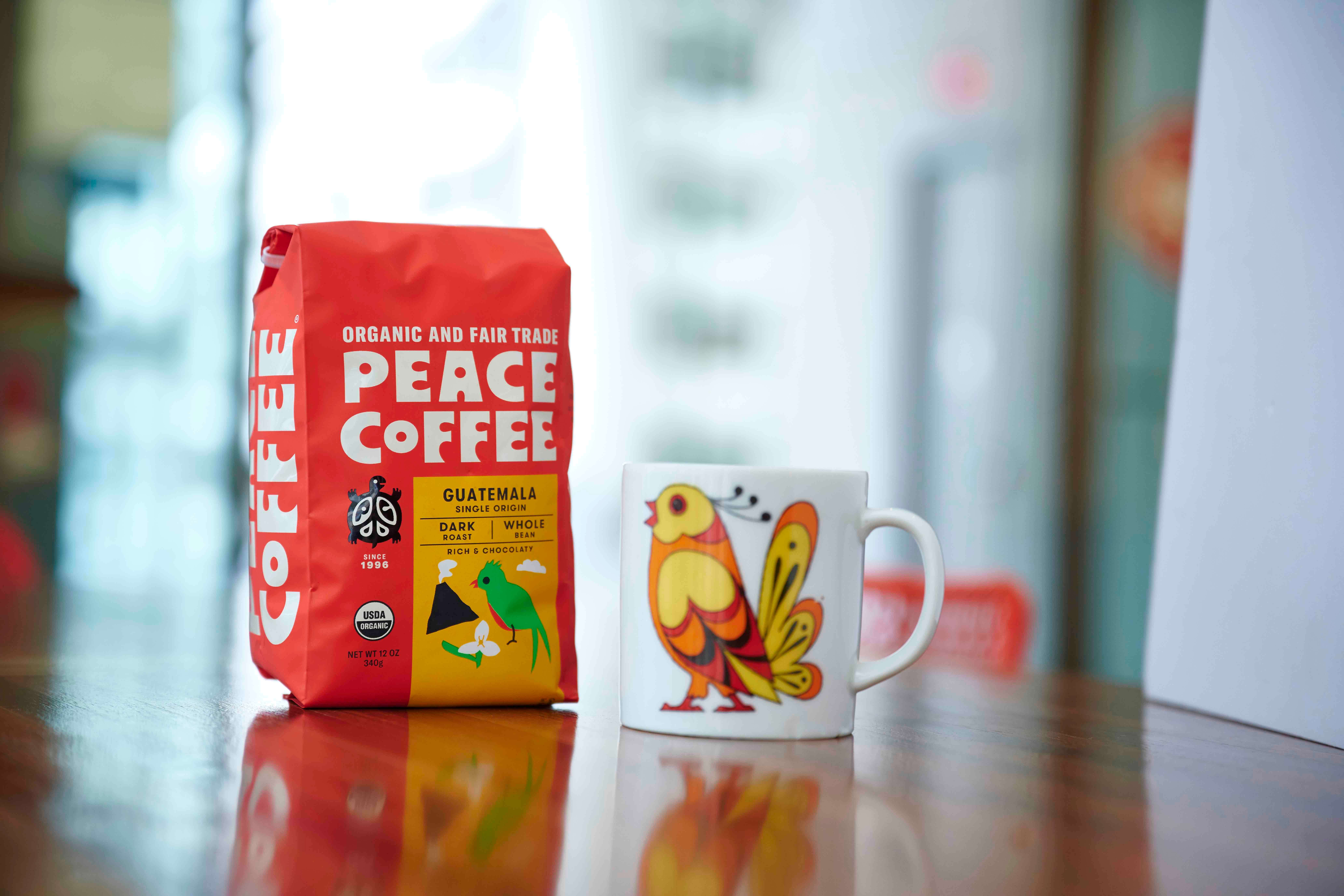 dark-roast-organic-coffee-guatemala bag of dark roast organic coffee with a fun mug