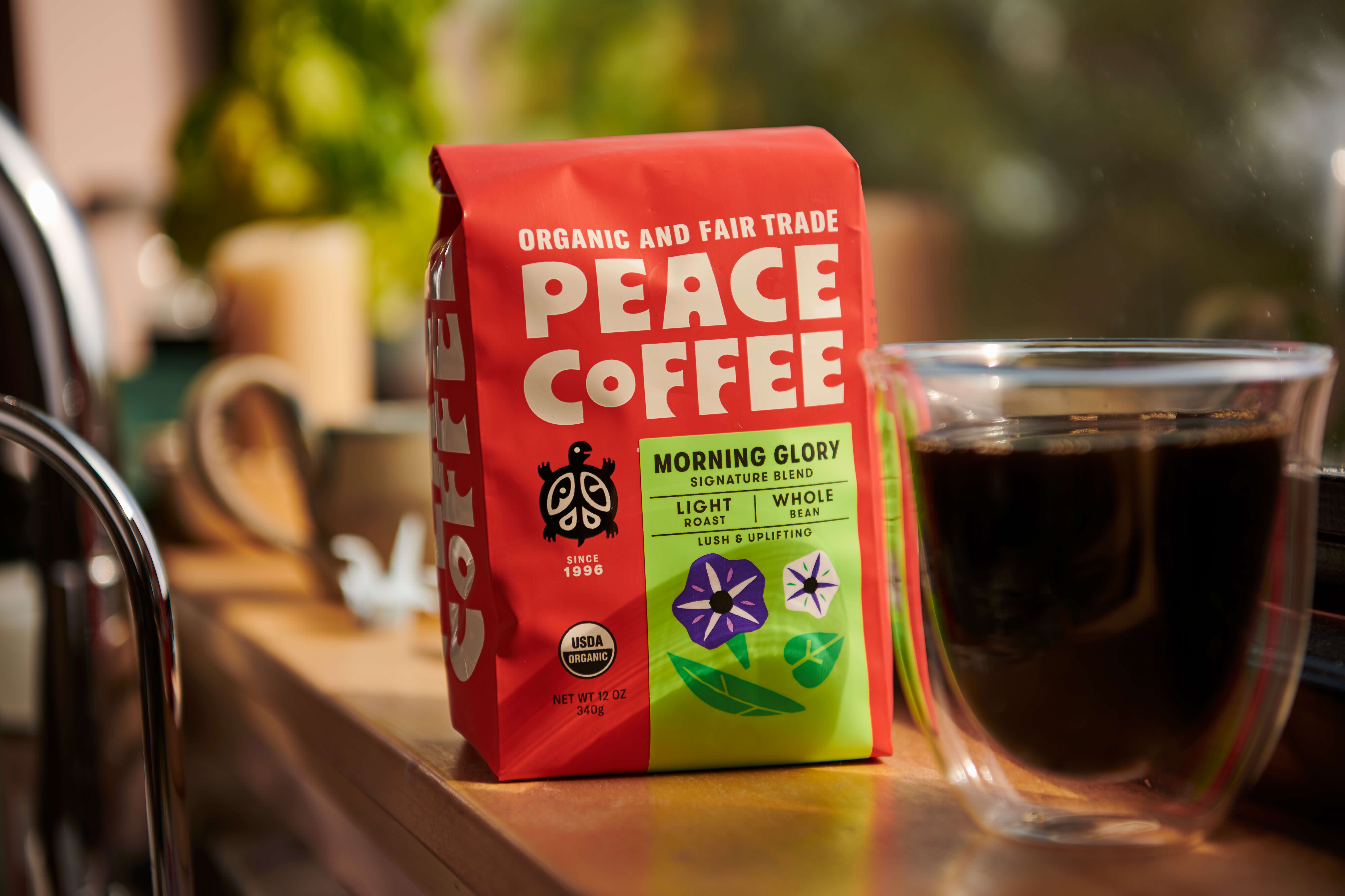bag-fair-trade-light-roast-coffee fair trade light roast coffee with a mug of brewed coffee